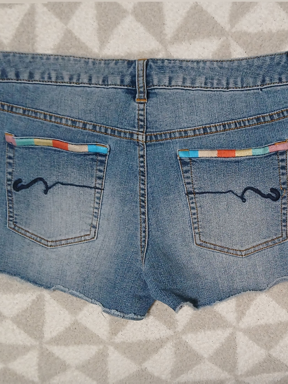 Lowrise Light Denim Jean Shorts with Rainbow Pocket Accent